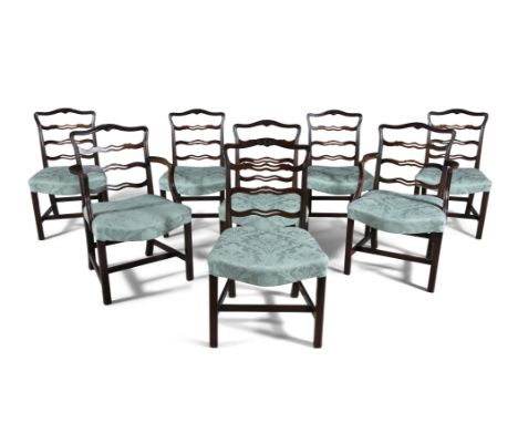 A SET OF 8 LADDER BACK MAHOGANY DINING CHAIRS, with two carvers and four singles, the seats upholstered in mint damask.