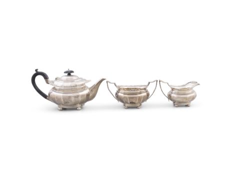 A SILVER TEA SERVICEChester c.1913/1915, mark of George Nathan & Ridley Hayes, comprising a teapot, sugar bowl and cream jug,
