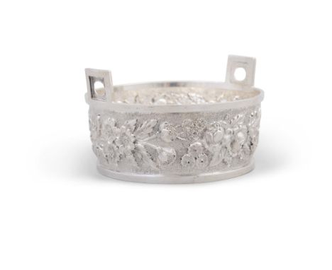 AN AMERICAN STERLING SILVER BUTTER DISH BY JACOBI & JENKINS, BALTIMOREwith raised handles, the circular body with repousse fl