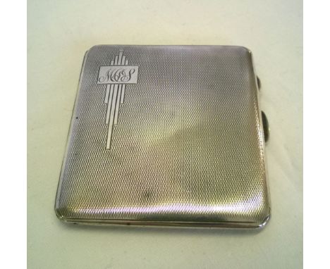 A hallmarked silver cigarette case with deco decoration and engine turning, Birmingham 1937.  Weight approx 88.1g