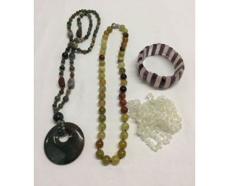 2 agate & natural stone necklaces together with a quartz necklace and an amethyst & rose quartz bangle.