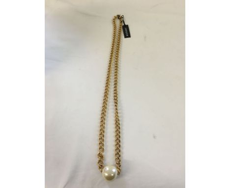 Jaeger long large link goldtone necklace with a big faux pearl pendant. Has original label.