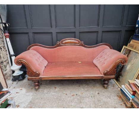 A Victorian mahogany and button upholstered scroll arm settee, 221cm wide. 