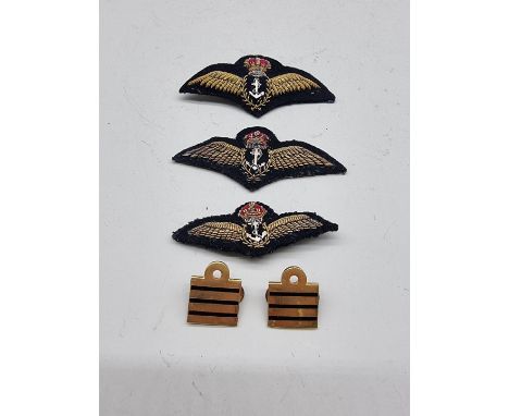 Three Royal Navy Fleet Air Arm commissioned pilots' bullion embroidered wings, (1938-53); together with a pair of Fleet Air A