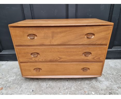 A vintage Ercol elm three drawer chest, 91.5cm wide.&nbsp; 