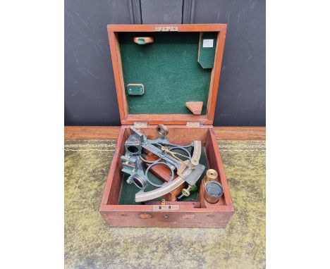 An antique brass sextant, inscribed 'Wilson &amp; Gillie. Bruce &amp; Sons Ld, Cardiff...', in mahogany case. 