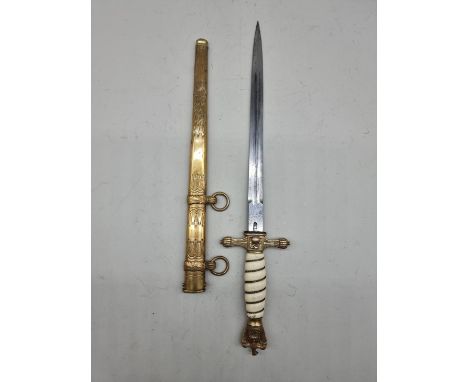 A German Third Reich M1938 Kriegsmarine officer's dagger and brass sheath, the blade inscribed&nbsp;W K C.