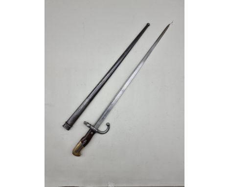 A French Model 1878 'Gras' sword bayonet and scabbard, by L Deny Paris, with 52cm blade.