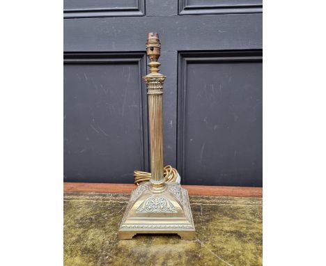 An old brass Corinthian column table lamp, total height 43cm. 