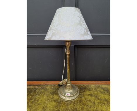 An interesting Islamic brass table lamp, height excluding fitting 52cm.&nbsp; 