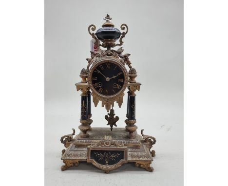 A Louis XVI style gilt metal mantel clock, 39cm high. 