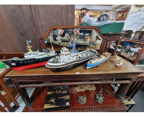 Four painted wood model boats, largest 78cm.&nbsp; 