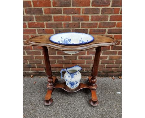 A Victorian mahogany washstand, with blue &amp; white pottery jug and basin, 88cm wide. 