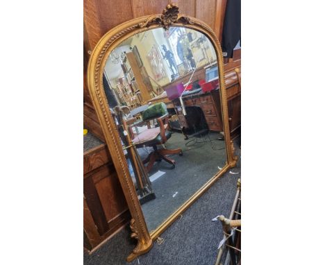 A large reproduction gilt framed overmantel mirror,&nbsp;140 x 136cm.&nbsp; 