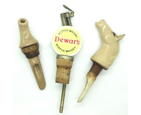 Three vintage ceramic drink/bottle pourers, one in the form of a white horse, largest size 60 mm. P&amp;P Group 1 (£14+VAT fo
