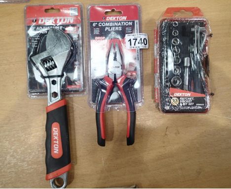 New and unused Dekton 6 inch combination pliers, new and unused Dekton 10 inch adjustable wrench and a new and unused Dekton 