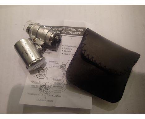 Cased 60 x magnification currency/ jewellery loupe with LED light, batteries and instructions. P&amp;P Group 1 (£14+VAT for t