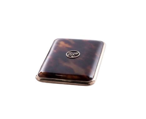 A George 9ct gold mounted tortoiseshell cigarette case with rounded corners and the applied name ‘Eve’ within a circular cart