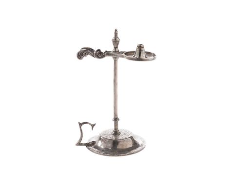 A Victorian Scottish silver wax jack, on a domed circular base with engraved decoration, a shaped handle, and pincer-like cla