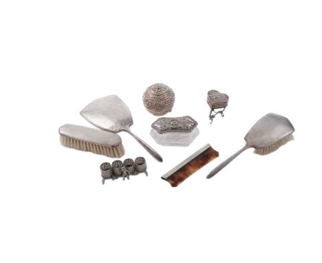 A mixed lot, to include: a continental silver heart-shaped dressing table box on scroll legs, gilt interior and English impor