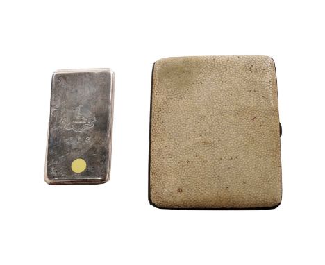 An Edwardian silver ‘patent’ calling card case, plain rectangular with rounded corners, a spring cover and a gilt interior, c