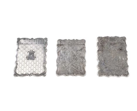 A Victorian silver card case, of shaped rectangular outline with an engraved scroll border and engine-turning, crested, by Hi