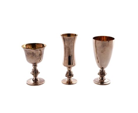 Three different Elizabeth II silver goblets, each with a ‘Celtic’ knop, gilt interior, all by Barrowclift Silvercraft, hallma