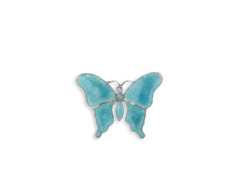 A rare late Victoria/Edwardian silver art nouveau brooch in the form of a butterfly, decorated in translucent turquoise ename