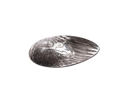 A contemporary Scottish silver caddy spoon with an alternating depression on each side, profusely engraved back and front wit