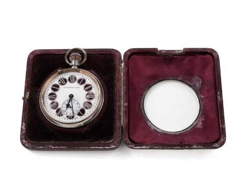 An Edwardian silver mounted leather watch case, plain rectangular with an easel stand, initialled ‘KB’; and fitted with a pla