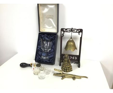 A Caithness glass goblet complete with box, four crystal salts, a Hammersley china candle snuffer, a leather tooled crocodile