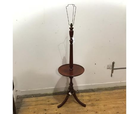A modern floor lamp table, the tapered fluted stem on a dished table top, on a turned tripod support (to lamp holder: 129cm)