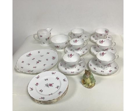 A Shelley teaset in Charm pattern, including six cups and saucers, sugar bowl and cream, six tea plates and a sandwich plate,