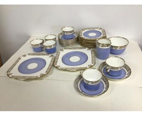 A Gladstone china teaset all with gilt Neoclassical decoration and sky blue ground, including six teacups, ten saucers, twelv