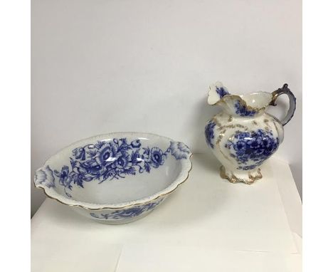 A Victorian wash basin with scalloped edge and gilt rim, with poppy decoration, stamped Poppy, Ironstone JM &amp;S. (h.12cm x