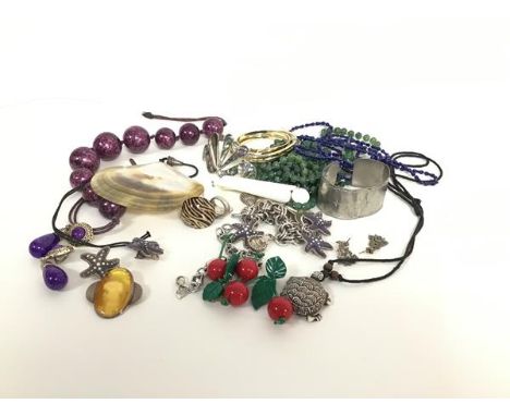 A collection of paste jewellery including bead necklaces, 1980s novelty earrings, Continental white metal ring, bracelet, hai