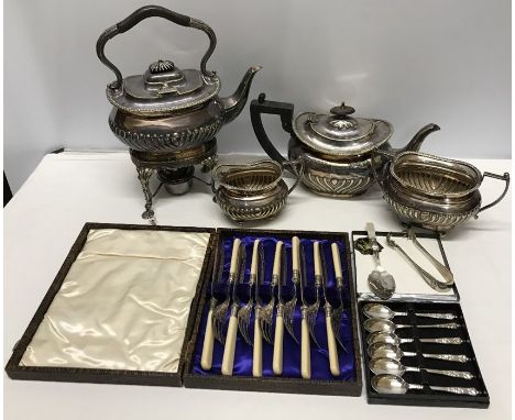 Silver plated ware, 3 piece tea set, spirit kettle on stand. Apostle spoons and cutlery set. 