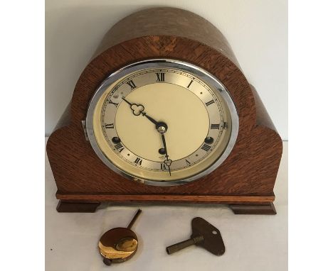 Oak cased Elliot mantle clock, Westminster chimes. 23cms h x 27cms w. 