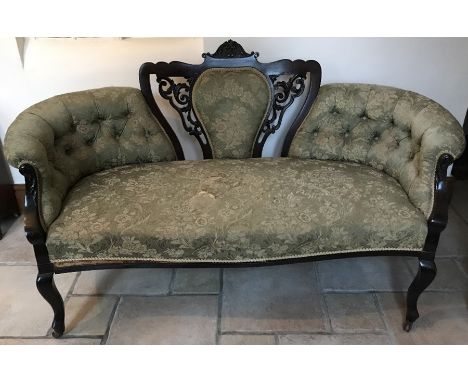 Edwardian mahogany framed sofa on cabriole legs. 