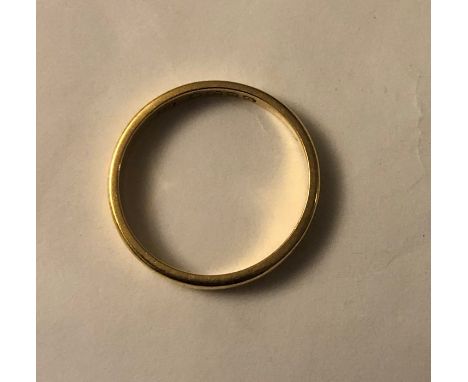 A 22ct gold wedding band. 2.8gms, size K/L