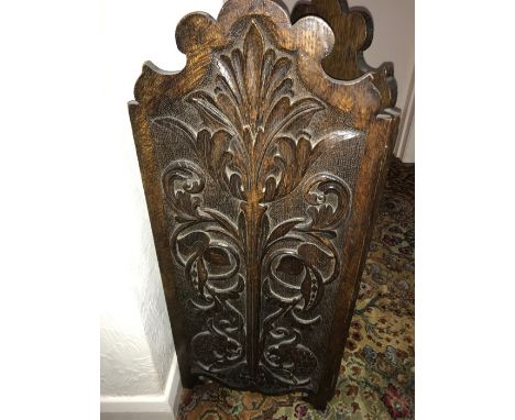 Two fold carved oak firescreen. 