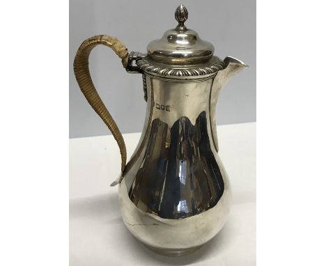 A London silver coffee pot, 1908, 25cms, C.S Harris and Sons Ltd, 600gms total weight. damage to handle.