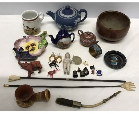 A mixed lot including Wedgwood Blue Jasper teapot, Cloisonne, miniature teapots, back scratchers, pipe, enamel badges, jet pe