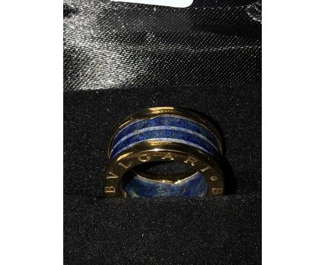 Ladies dress ring marked Bvlgari. Size L. marked to inside Bvlgari 750 made in Italy AN852405. Very good condition, very ligh