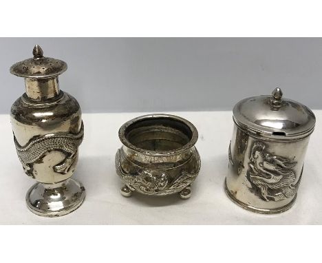 Three piece Chinese silver salt, pepper, mustard marked WC90. A slight movement to hinge on mustard pot. 166.5gms.