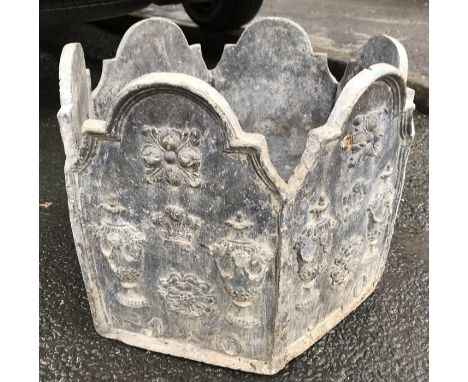 A decorative lead planter. 38 h x 44cms d. 