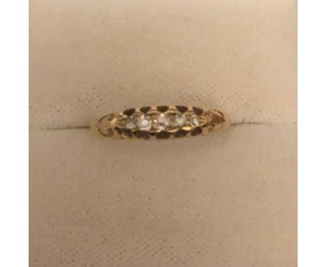 A five stone diamond ring set in yellow metal, 19thC, size K/L. 2.1gms. 