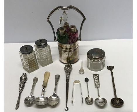 Coloured glass scent bottles (missing one stopper) in a white metal holder marked 800, silver topped glass pepper and mustard