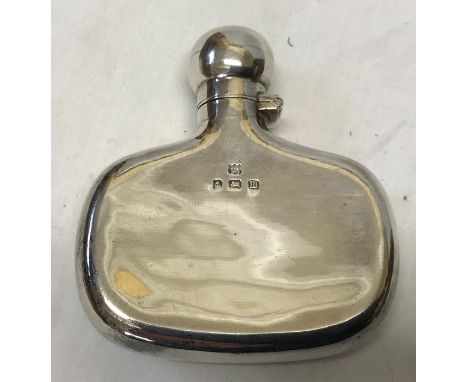 A Birmingham 1911 silver dram hip flask, William Neale and Son, 31.7gms.