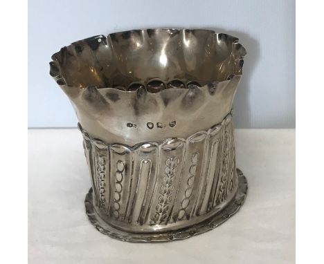 Hallmarked silver beaker vase with embossed decoration G.B. London 1893 approx 74gms. 